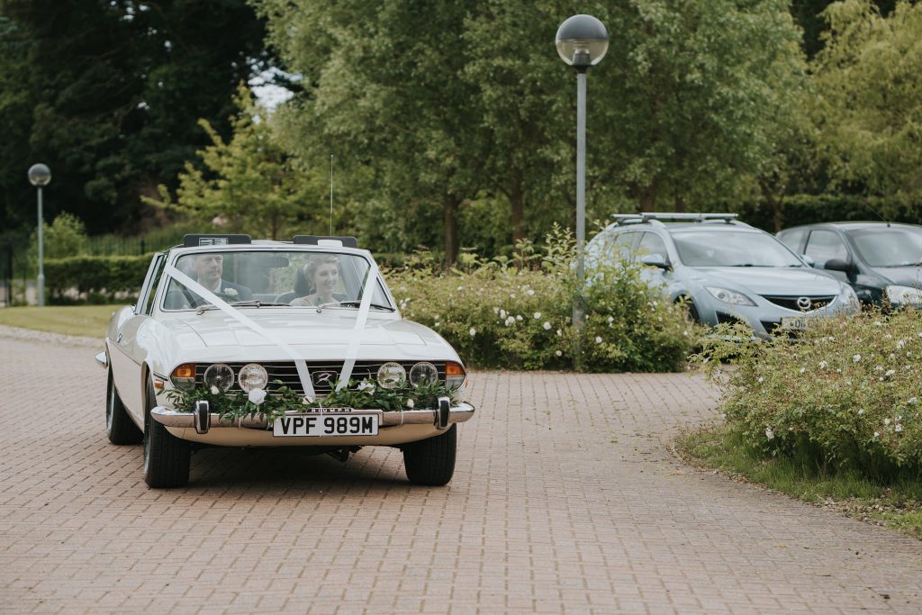 Triumph classic wedding car