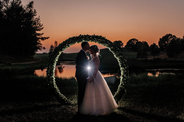 A couple enjoying themselves on their wedding day